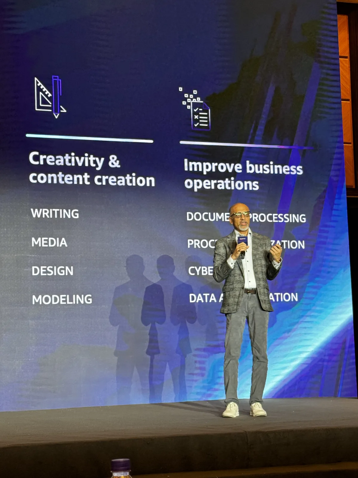 Ritesh Vajariya delivering an AI keynote in Beijing